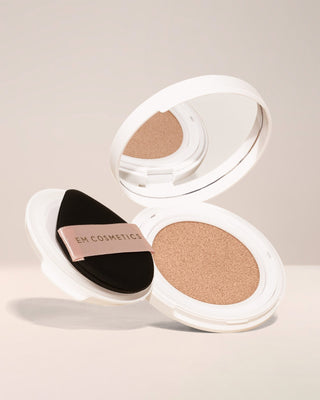 EM Cosmetics Daydream Cushion Foundation with SPF in Gentle Light, a light shade with neutral undertones for a dewy look.