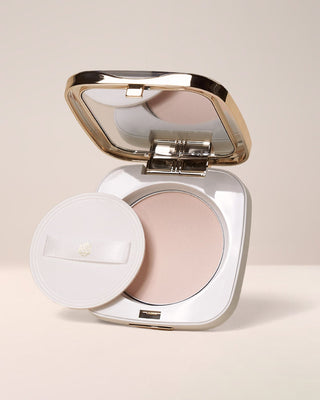 EM Cosmetics Portrait Mode Setting Powder shown open, revealing the finely-milled, translucent powder and applicator puff.
