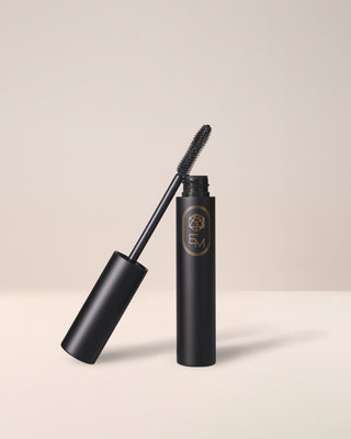 EM Cosmetics Shapeshift Tubing Mascara shown open, revealing its unique wand for lengthening and volumizing lashes.