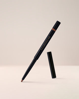 EM Cosmetics Soft Blur Velvet Lip Liner in Mink, a cool taupe pencil ideal for creating contour and soft definition.